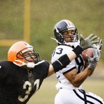 Football Player Attempting Block Football Player Attempting Block